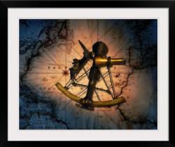 Historic sextant with old world map in background
