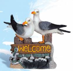 Twin Seagulls With Welcome Sign