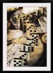 Row of dominoes on old world map