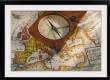 Antique compass on map